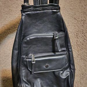 2 backpack purses, 2 handbags. 1 pair of boots, and 2 pairs of slip on shoes